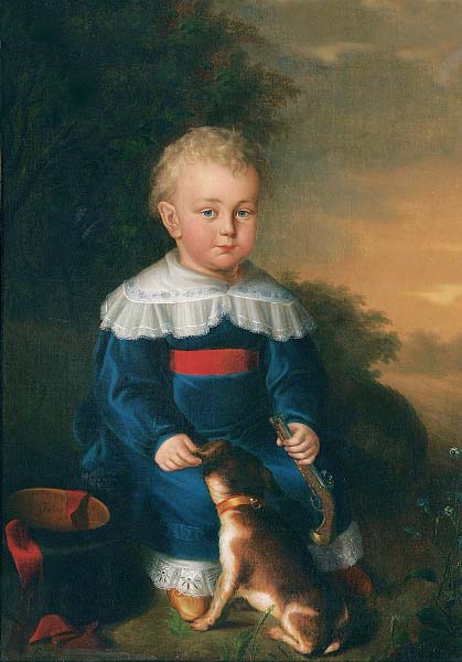 Portrait of a young boy with toy gun and dog